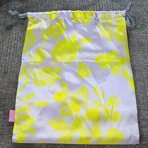 Ipsy April 2021 floral yellow and white drawstring closure cosmetic bag